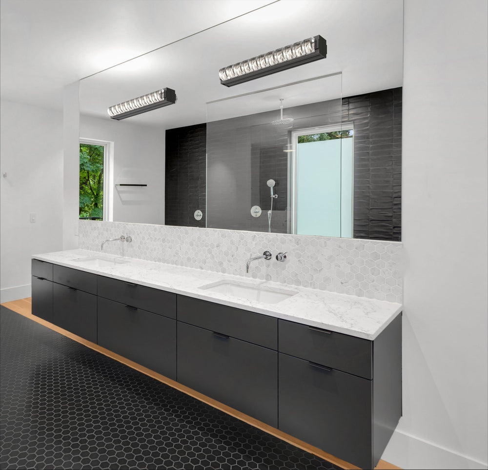 Tessera Vanity Sconce by Hammerton Studio in a styled interior