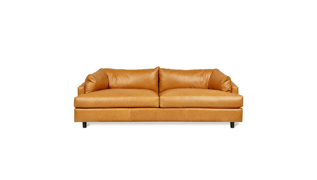Thalia Sofa in Tucson Honey Leather on white background