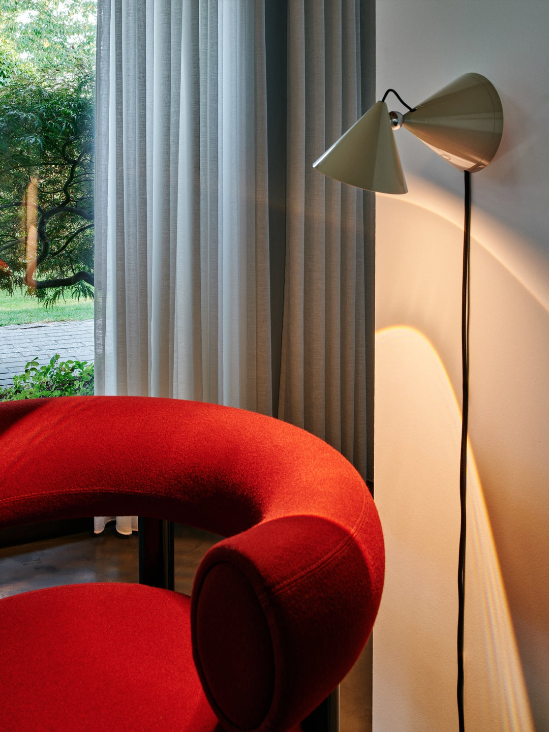 Tom Dixon Pose Surface Light in a modern interior
