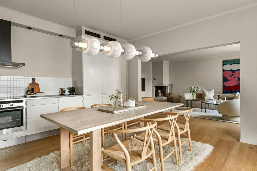 Torno Mandrel Linear Chandelier by Hammerton Studio in a styled interior