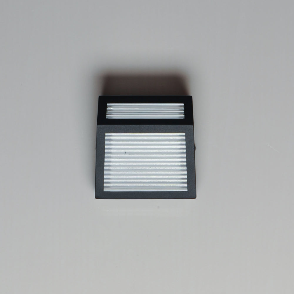 Totem Small Outdoor LED Sconce by ET2 Lighting, styled view 1
