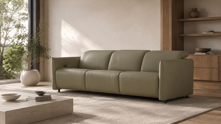 TUCKER Olive leather reclining sofa in a modern home
