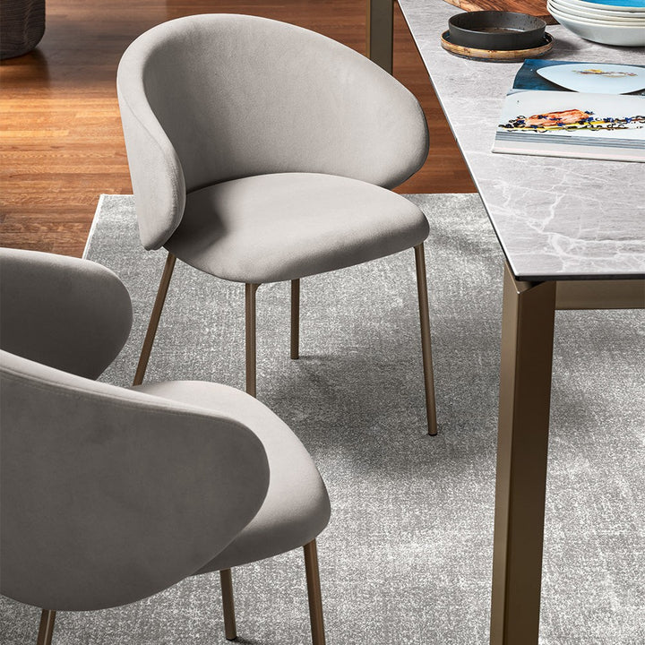 Tuka Dining Armchair by Connubia in a styled interior