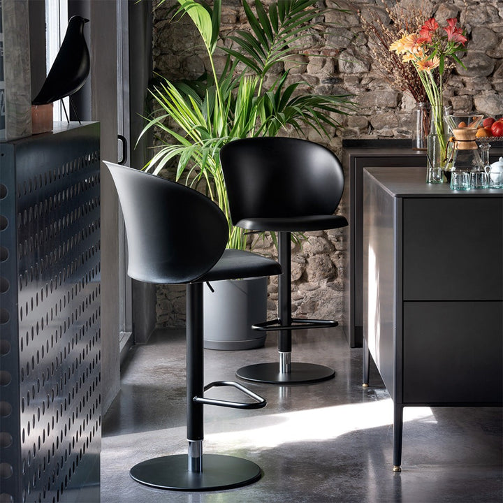 Tuka Metal Adjustable Stool by Connubia in a styled interior
