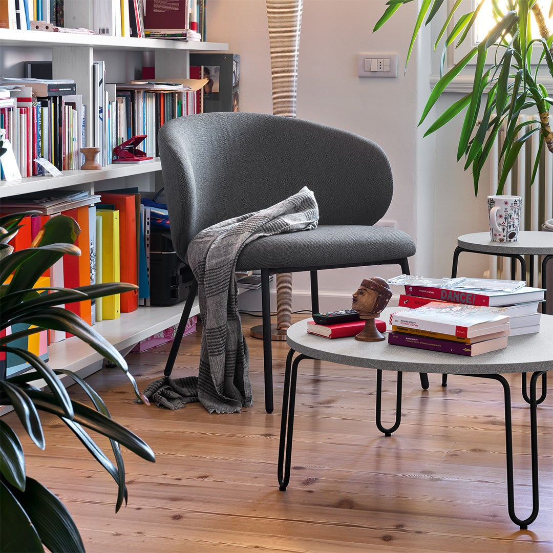 Tuka Metal Lounge Chair by Connubia in a styled interior
