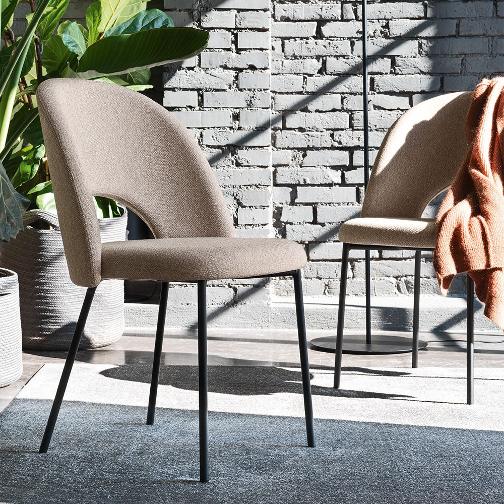 Tuka Mid Hole Dining Chair by Connubia in a styled interior