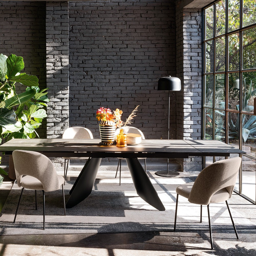 Tuka Mid Hole Dining Chair by Connubia in a styled interior