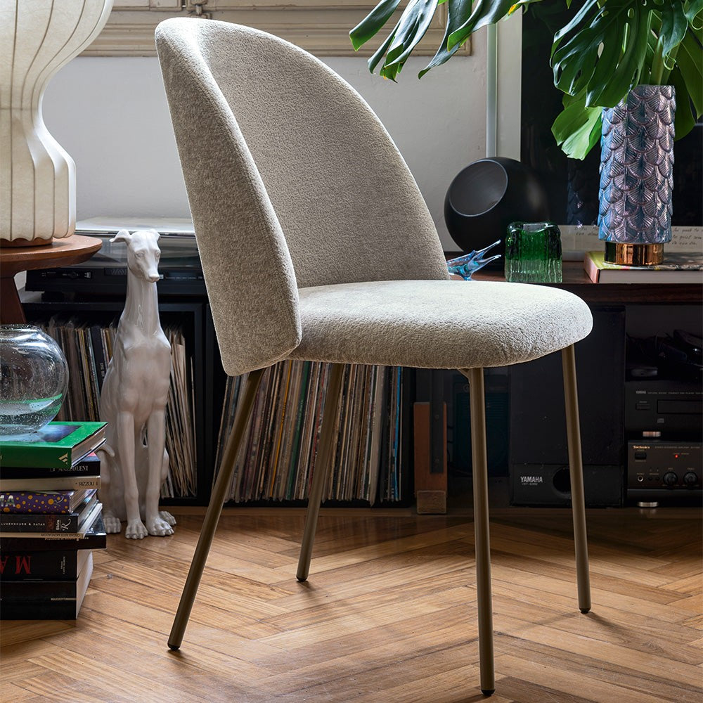 Tuka Mid Metal Dining Chair by Connubia in a styled interior