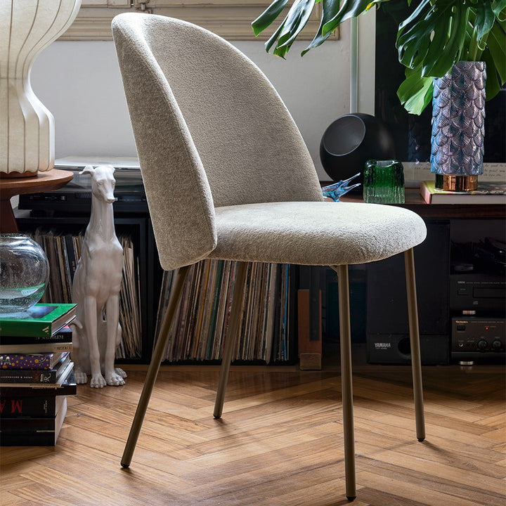 Tuka Mid Metal Dining Chair by Connubia in a styled interior
