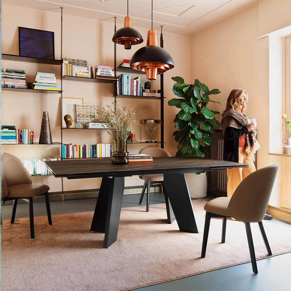 Tuka Mid Wood Dining Chair by Connubia in a styled interior