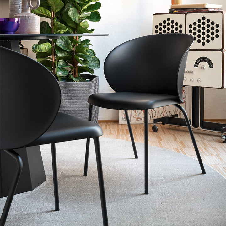 Tuka Tubular Dining Chair by Connubia in a styled interior