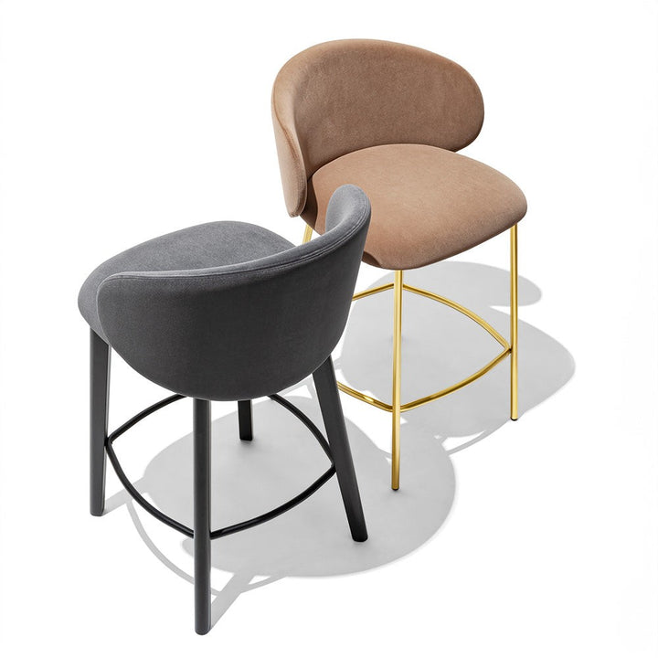 Tuka Wood Counter Stool by Connubia in a styled interior