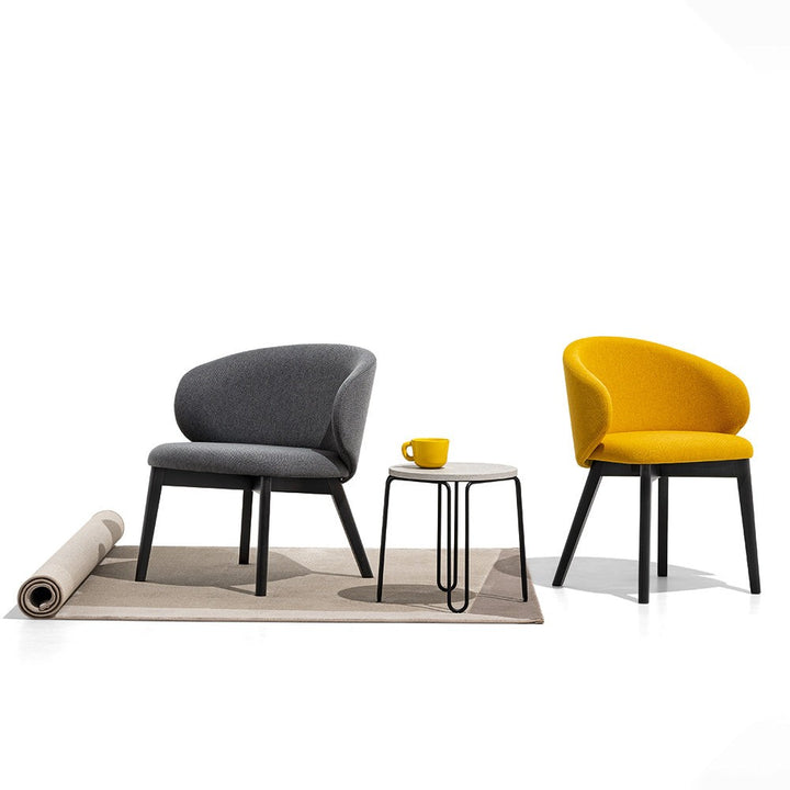 Tuka Wood Dining Armchair by Connubia in a styled interior