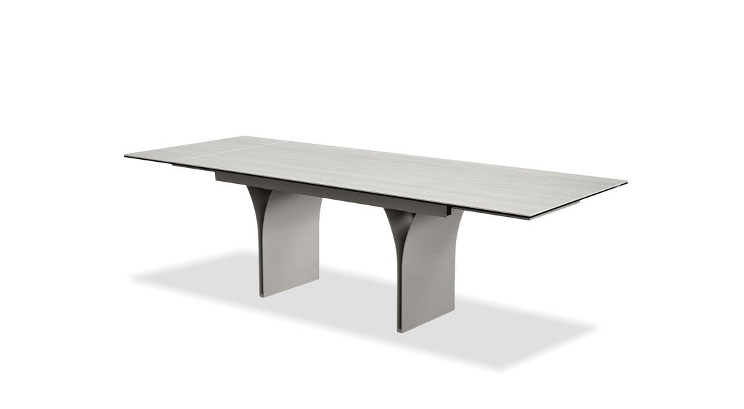CAMBER Dining Table in Bianco Bocciardato Travertine
