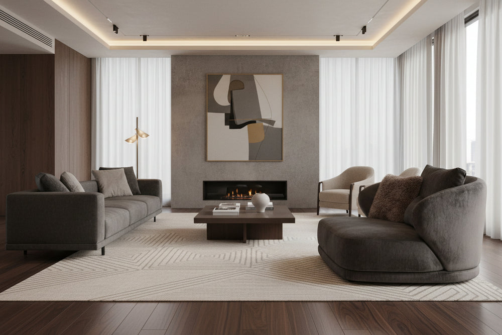 A modern round lounge chair upholstered in dark gray velvet, featuring two back cushions and a textured brown throw pillow, shown on a plain white background.