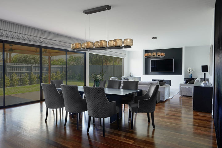 Vessel Linear Chandelier by Hammerton Studio in a styled interior