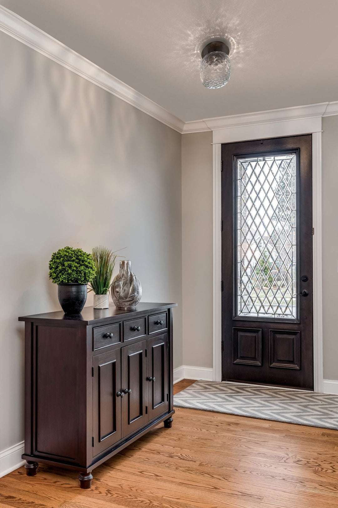 Vessel Single Glass Sconce &amp; Flush Mount by Hammerton Studio in a styled interior