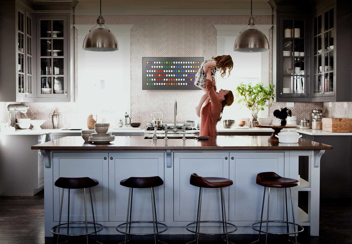Vestaboard split-flap display in a modern home