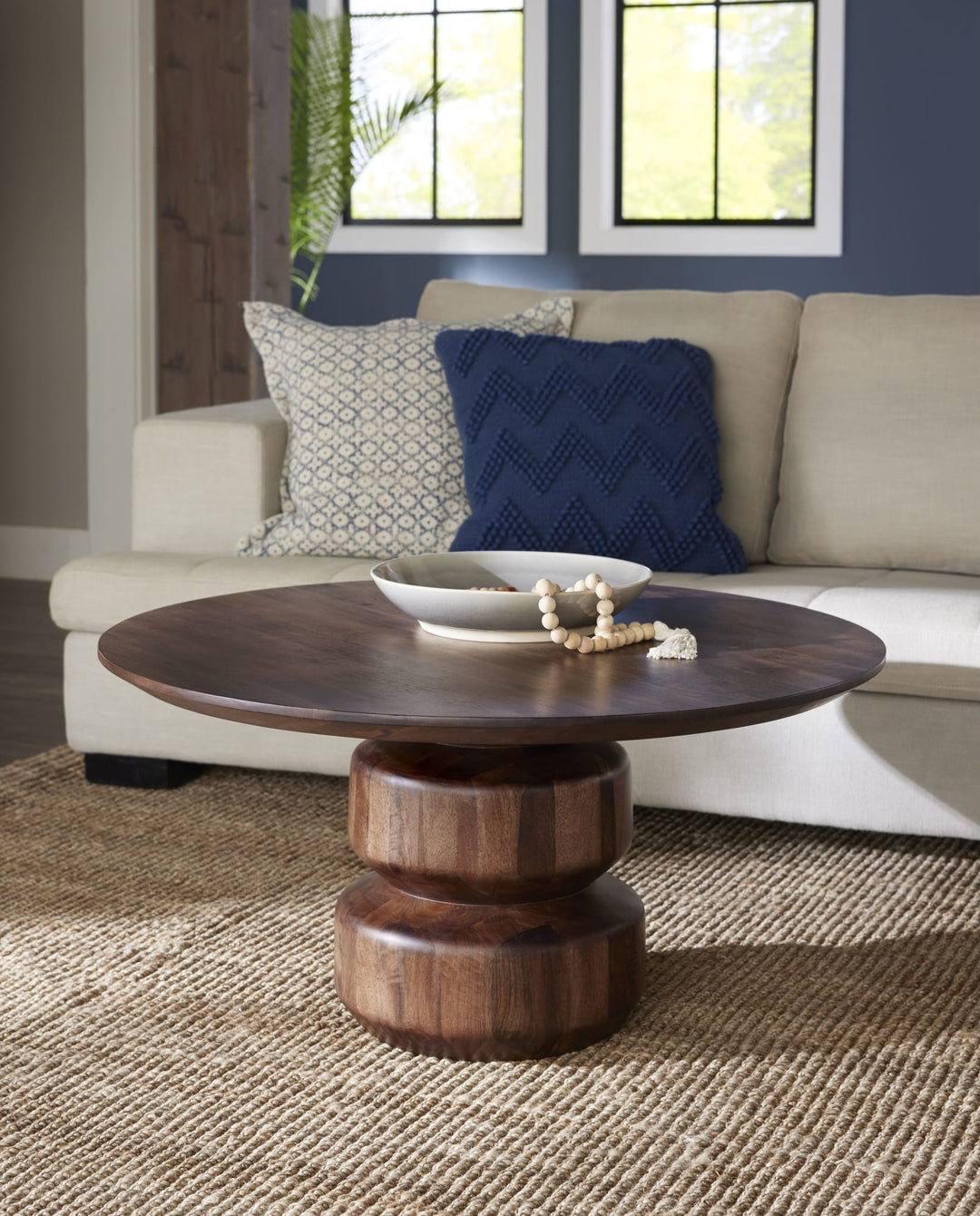 Virton Solid Wood Round Coffee Table in Smoked Brown — lifestyle photo