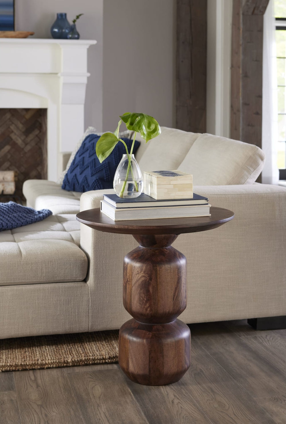 Virton Solid Wood Round End Table in Smoked Brown — lifestyle photo