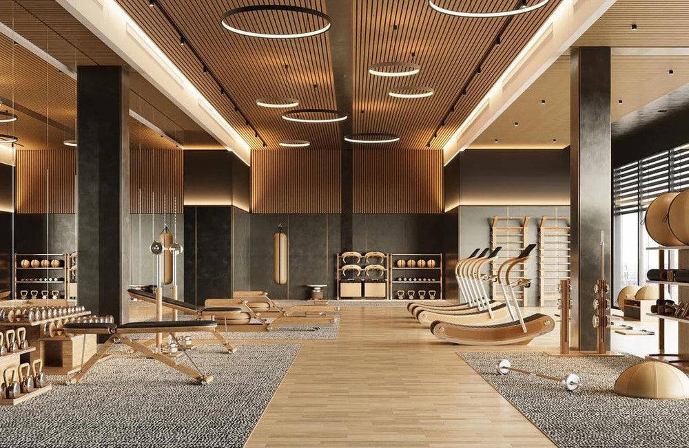 PENT Fitness showroom with wood fitness equipment, weights and exercise benches