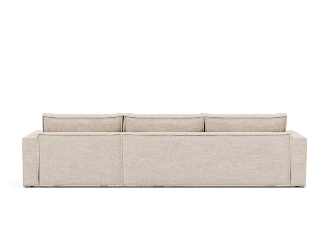 Newilla Sleeper Chaise Sectional (standard arm) by Innovation Living in Blida Sand Grey, sofa position, back view on white
