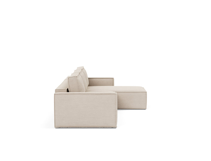 Newilla Sleeper Chaise Sectional (standard arm) by Innovation Living in Blida Sand Grey, sofa position, side view on white