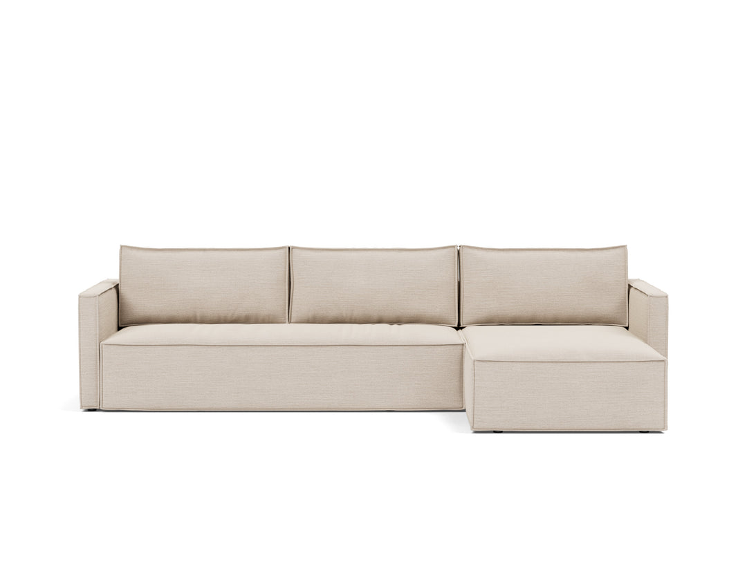 Newilla Sleeper Chaise Sectional (slim arms) by Innovation Living in Blida Sand Grey, sofa position, front view on white