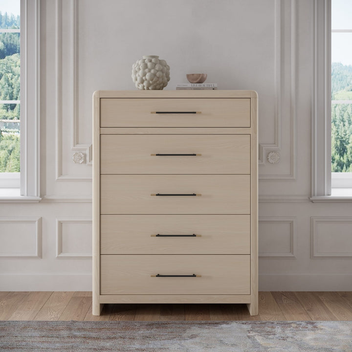 Wallen Five Drawer Chest in White Sand — styled in a room