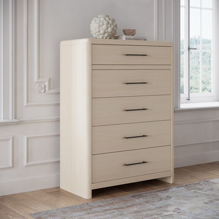Wallen Five Drawer Chest in White Sand — styled in a room