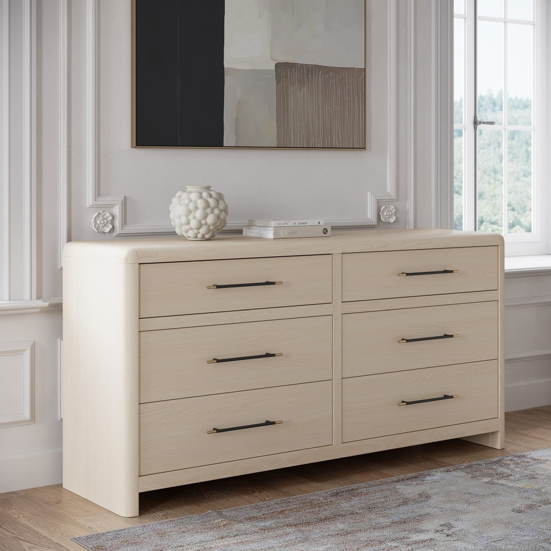 Wallen Six Drawer Dresser in White Sand — styled in a room