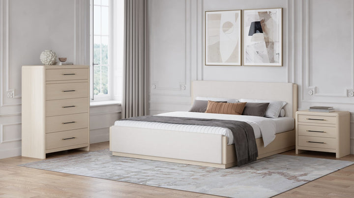 Wallen Upholstered Bed in White Sand styled in a bedroom