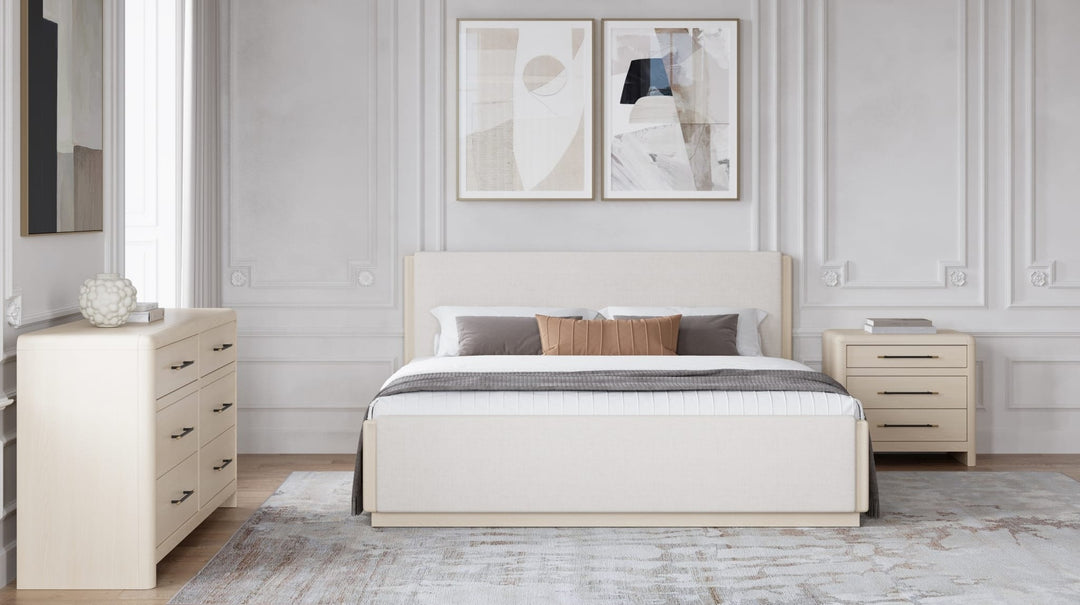 Wallen Upholstered Bed in White Sand styled in a bedroom