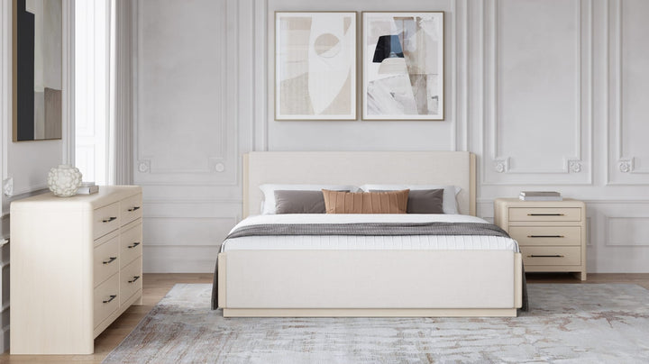 Wallen Upholstered Bed in White Sand styled in a bedroom