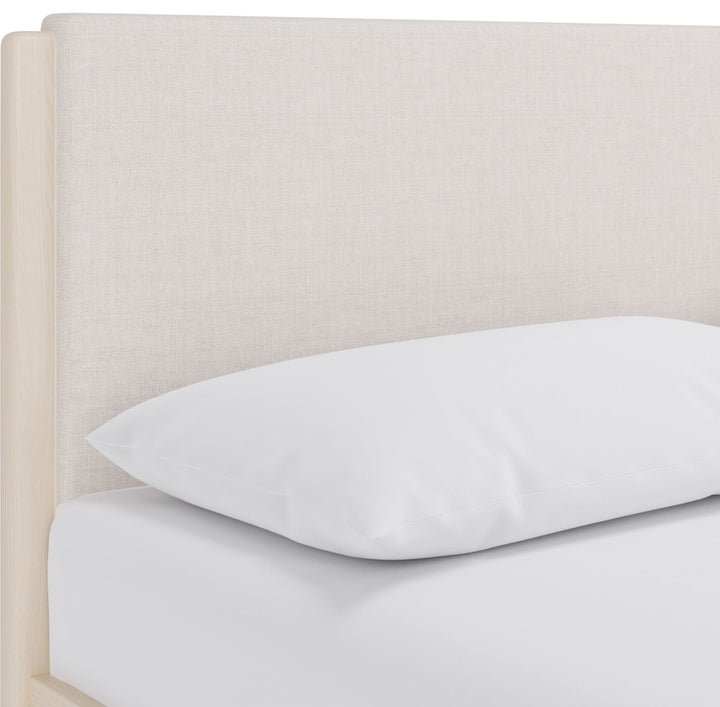 Wallen Upholstered Bed in White Sand — close-up of the headboard
