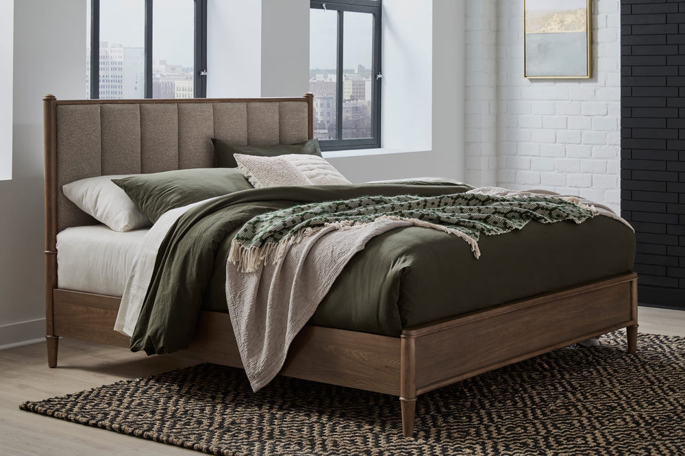 Whitmore Wood and Upholstered Bed styled in a bedroom