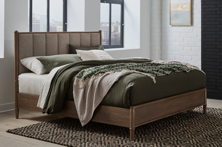 Whitmore Wood and Upholstered Bed styled in a bedroom
