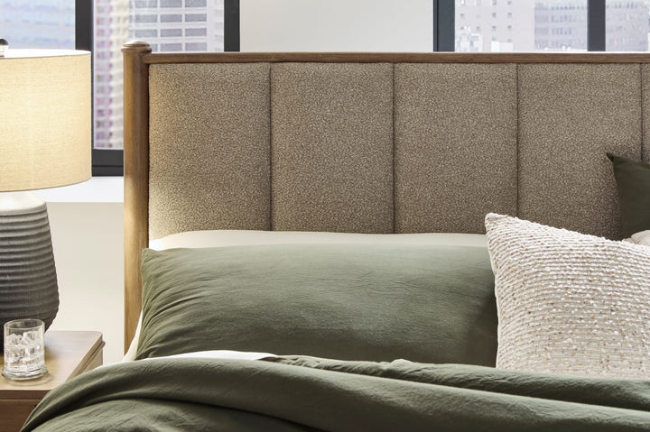 Whitmore Wood and Upholstered Bed styled in a bedroom