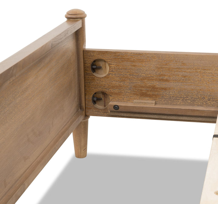 Whitmore Wood and Upholstered Bed — close-up of the headboard post and rail fitting