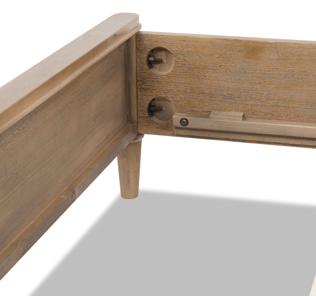 Whitmore Wood Bed in Claystone — close-up of the headboard post and rail fitting