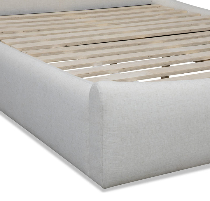 Windham Upholstered Bed in Whipped Honey — close-up of the footboard and slats