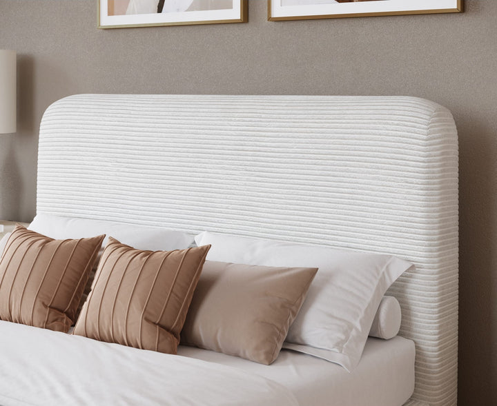 Wisteria Upholstered Platform Bed in Frosty Corduroy styled in a bedroom