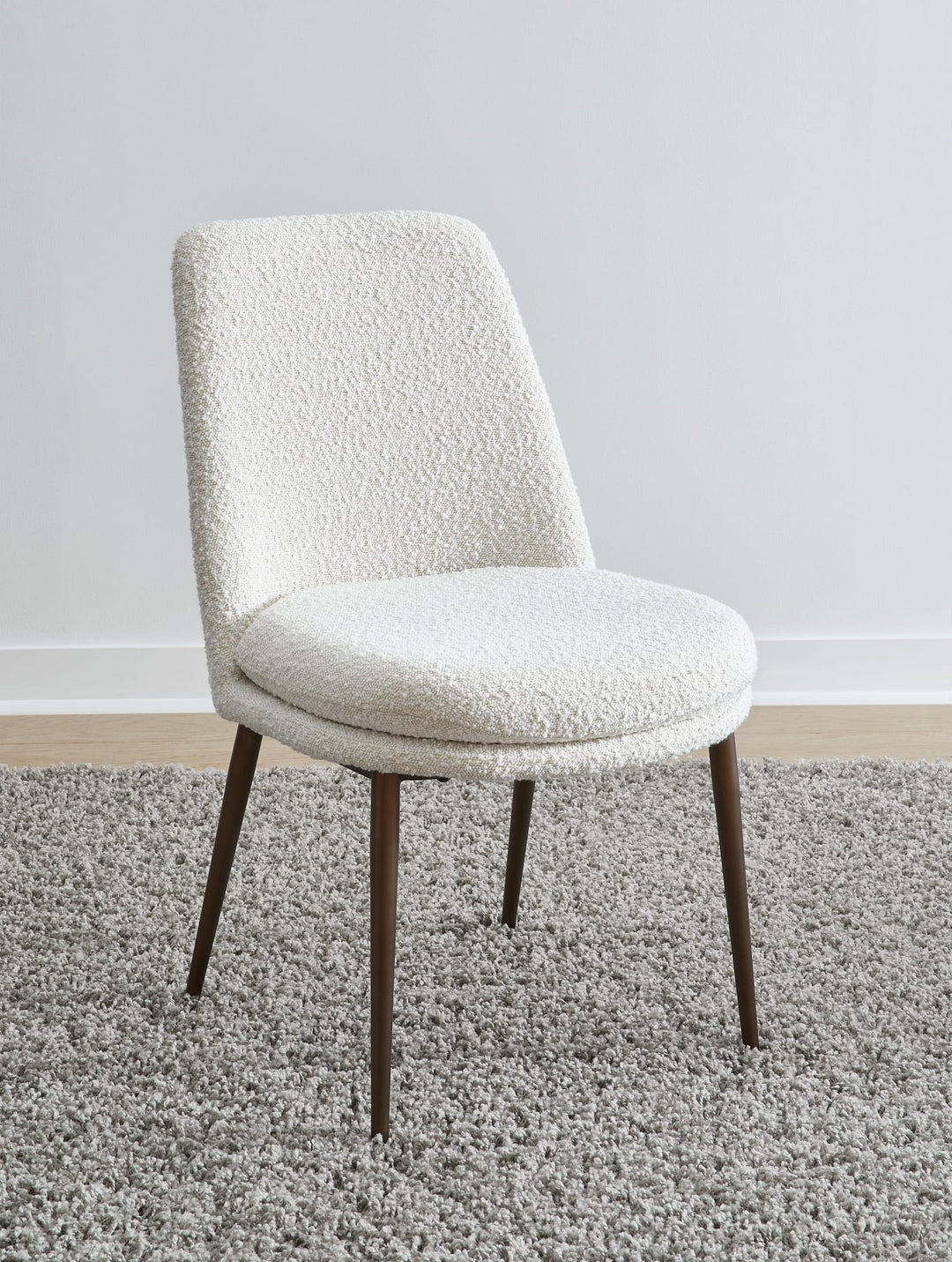 Wyatt Upholstered Dining Chair in Ricotta Boucle and Bronze Metal — lifestyle photo