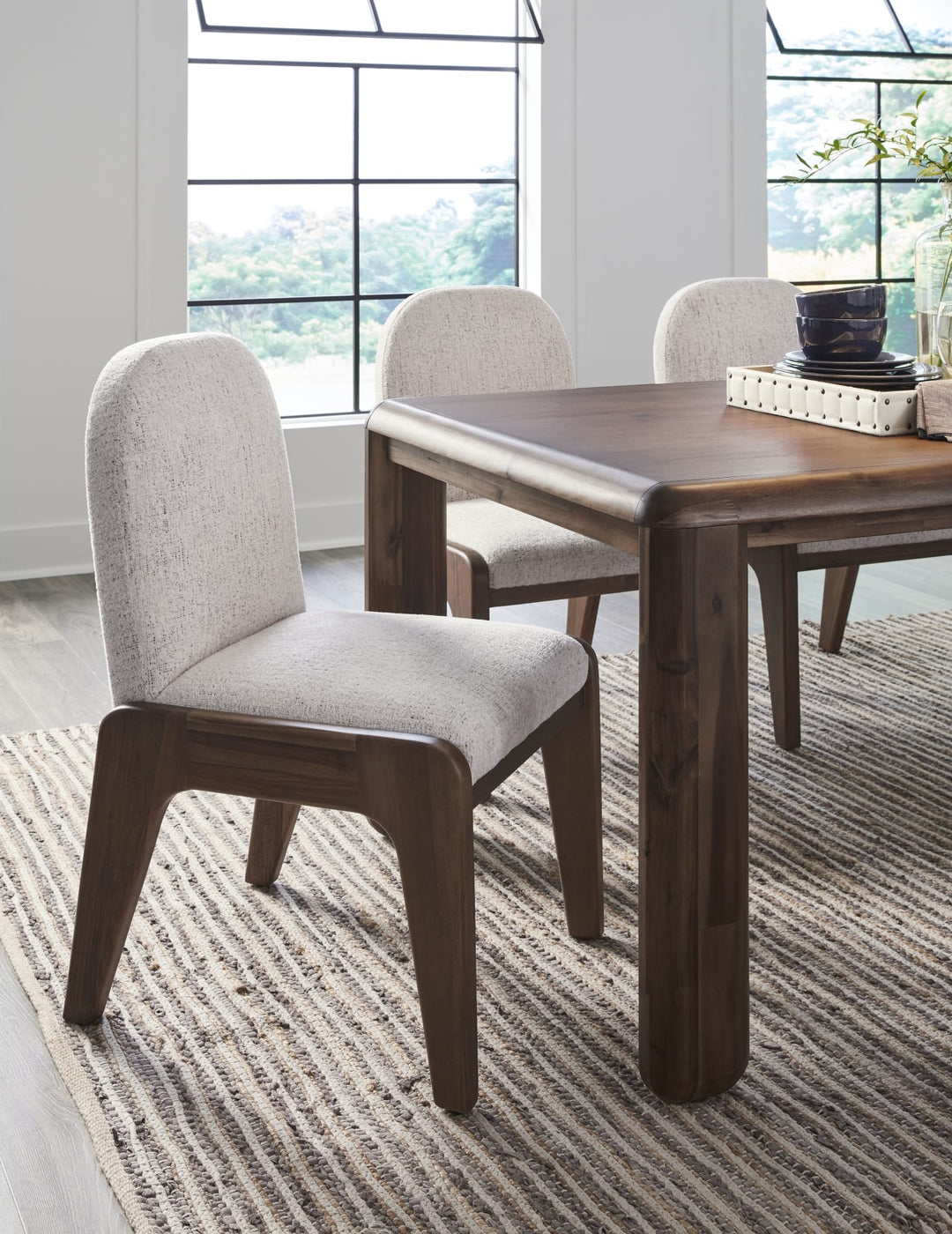Xolani Chenille Upholstered Dining Chair in Chinchilla and Impala — lifestyle photo