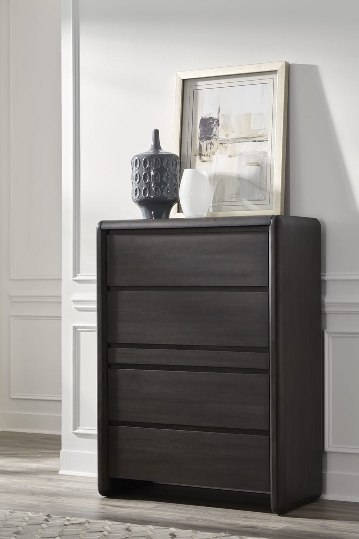 Xolani Five Drawer Chest with Jewelry Tray in Jaguar — styled in a room