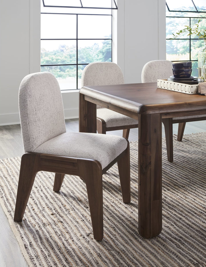 Xolani Leg Dining Table in Impala — lifestyle photo