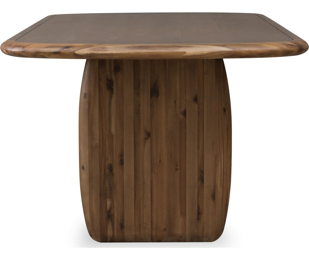 Xolani Pedestal Dining Table in Impala — product view on a white background
