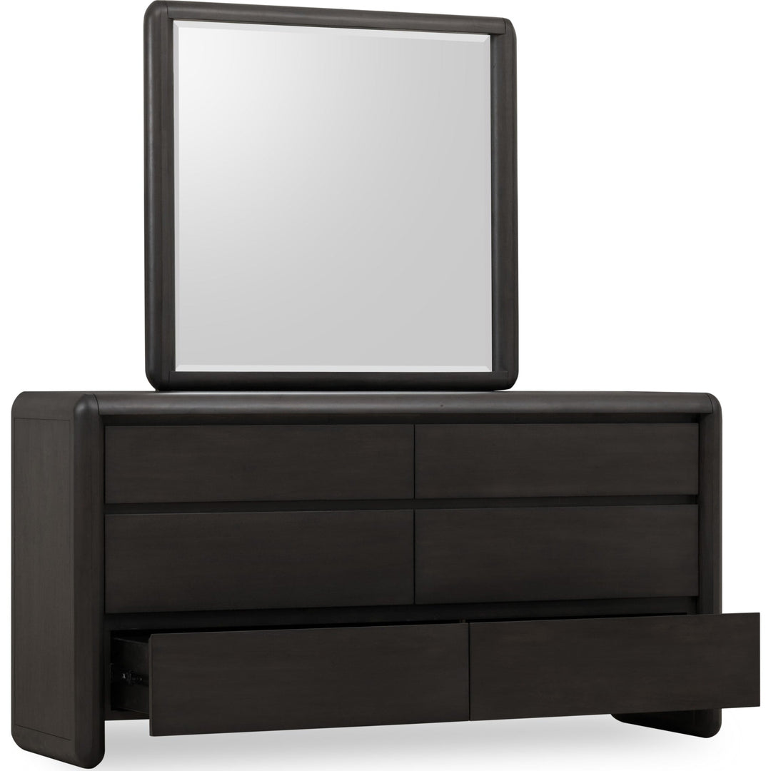 Xolani Six Drawer Dresser in Jaguar — with drawers open, shown with the matching mirror (sold separately)