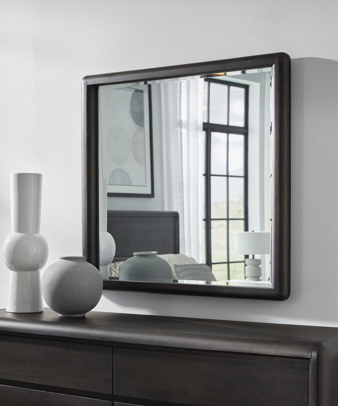 Xolani Wall or Dresser Mirror in Jaguar — styled on the matching dresser (sold separately)