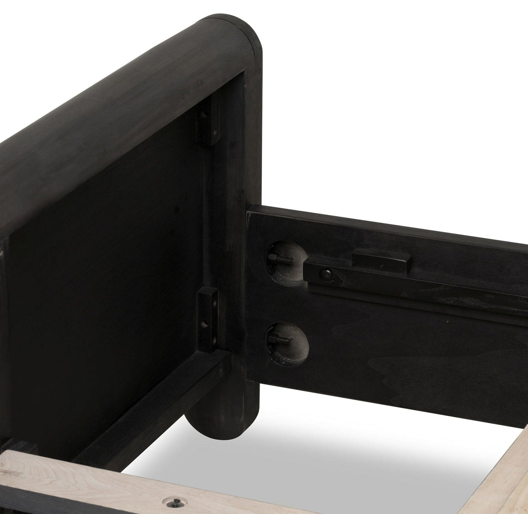 Xolani Wood Platform Bed in Jaguar — close-up of the headboard post and rail fitting